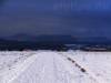 Dicke Schneewolken über dem Albtrauf mit Roßberg (links)